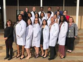 Biomedical Students Receive White Lab Coats